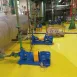 Aplicación de pintura industrial en una estructura metálica.