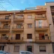 Trabajos verticales en rehabilitación de fachada de comunidad en Sevilla