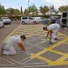 Delimitación y señalización exterior del aparcamiento de la nave Electrostocks Sevilla con marcas horizontales y pintura resistente.